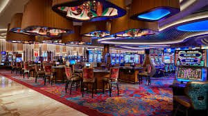 Live casino table with multiple dealers and chat interface